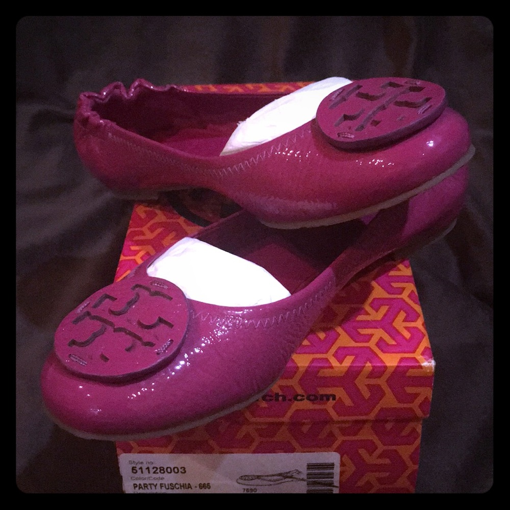 Tory Burch Reva tumbled patent grain flats.